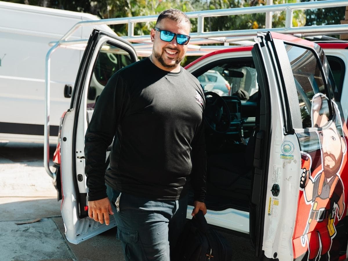 Prime Garage Door technician arriving for a residential garage door spring repair appointment